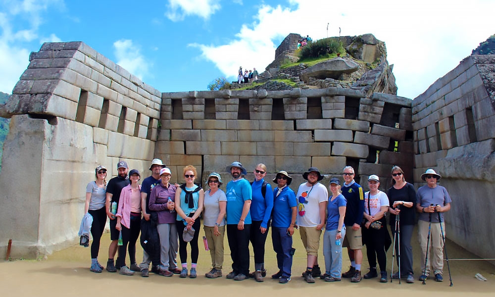 Passengers taking a tour at the Machu Picchu ruins